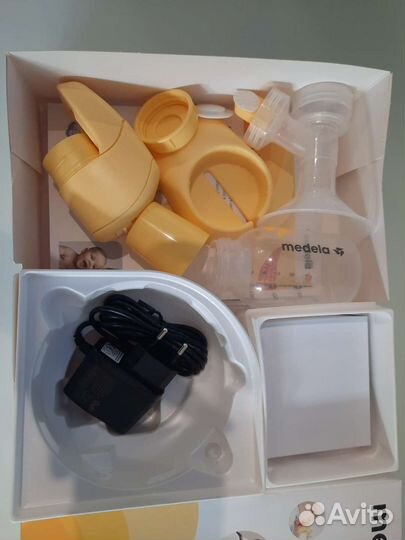 Молокоотсос medela электрический