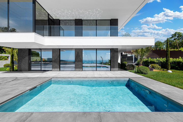 Коттедж 393 м² на участке 7 сот.