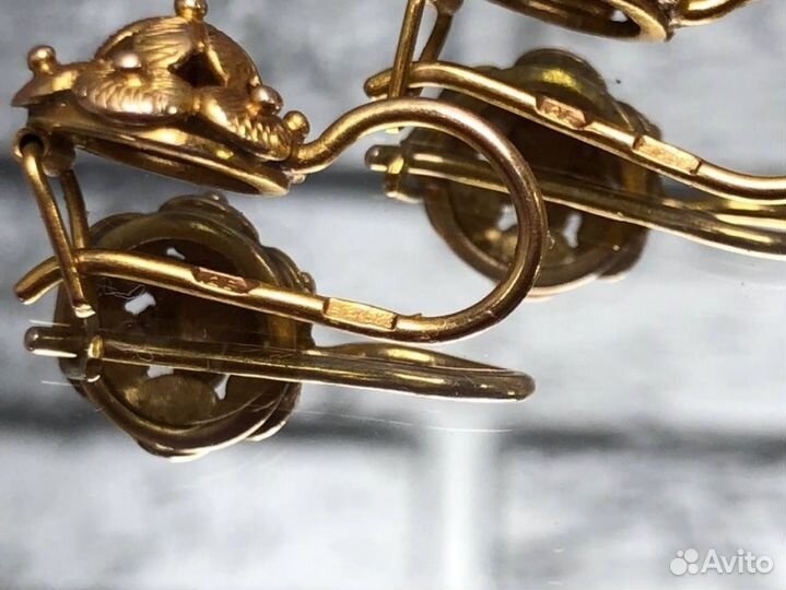 Золотые серьги 583 пробы массой 3,57 грамма