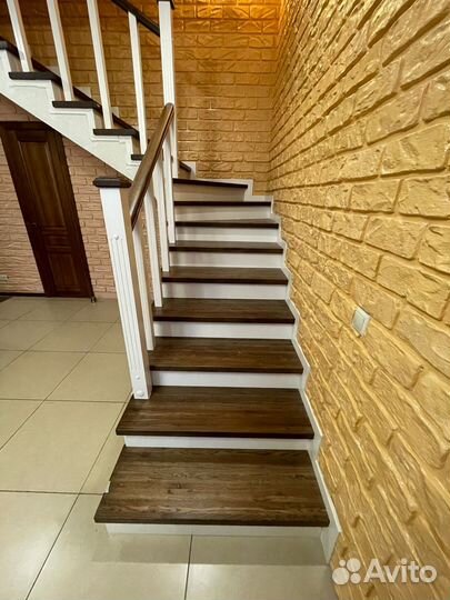 Облицовка бетонного каркаса лестницы деревом