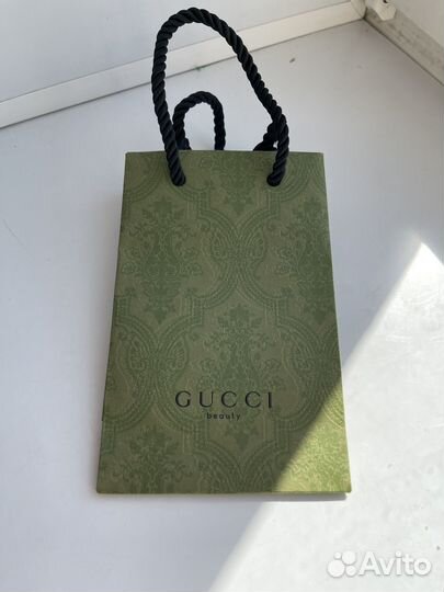 Коробки и пакеты Gucci