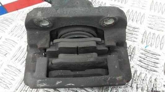 Суппорт тормозной передний левый dacia sandero 1