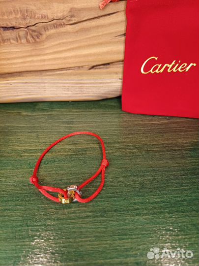 Браслет cartier красная нить