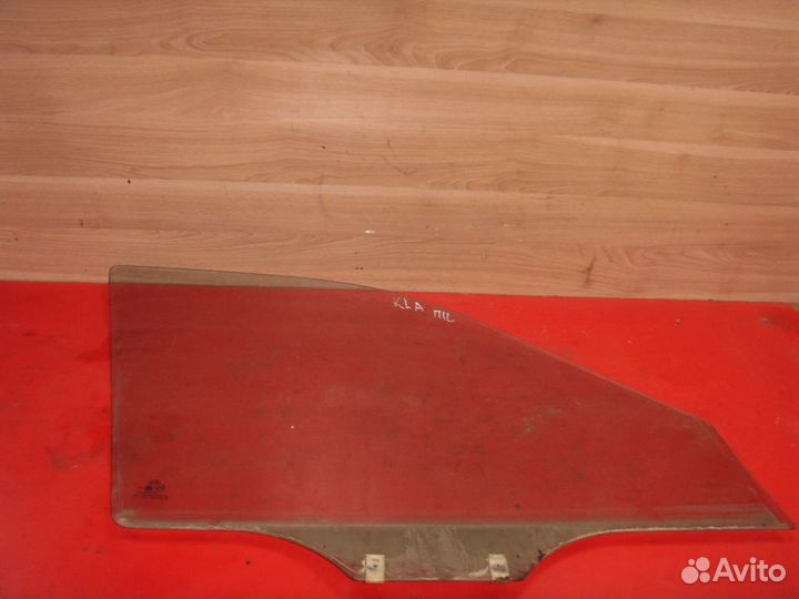Стекло двери 0K9A058511B Kia Clarus 1996-2001