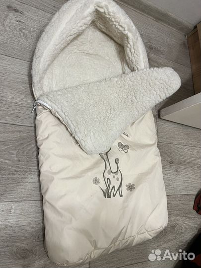 Меховой конверт в коляску