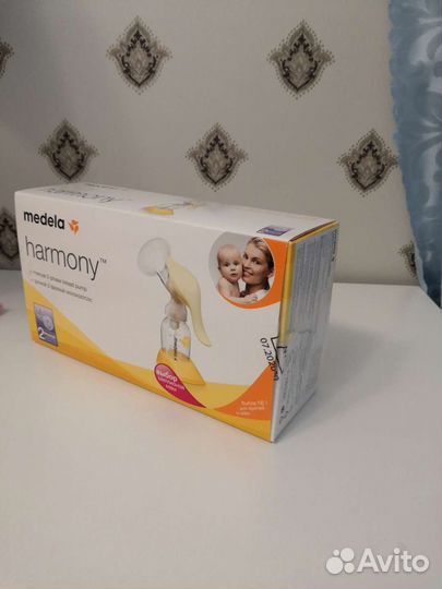 Молокоотсос medela ручной