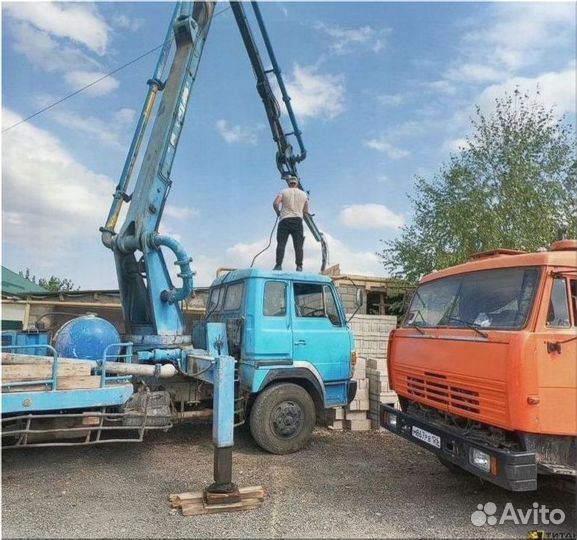 Доставка бетона миксером с лентой