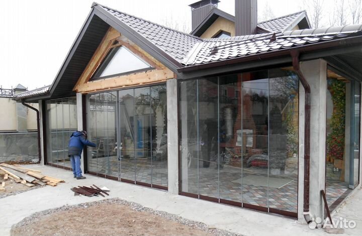 Безрамное остеклениедля частного дома