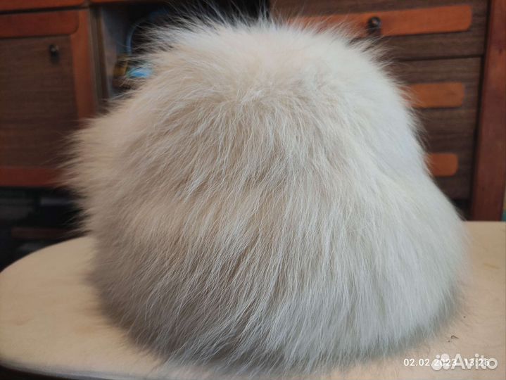 Женские меховые шапки