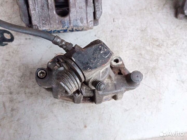 Суппорт задний Mazda 3 BK BL