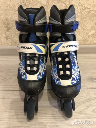 Роликовые коньки