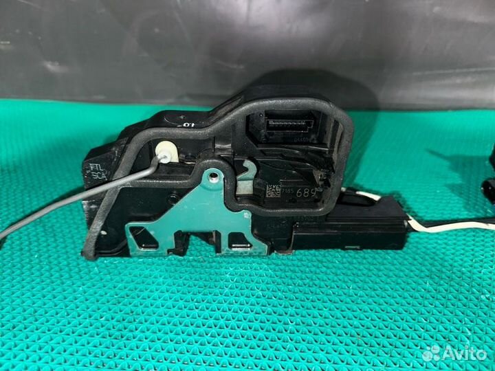 Замок боковой двери передний левый Bmw 7-Series