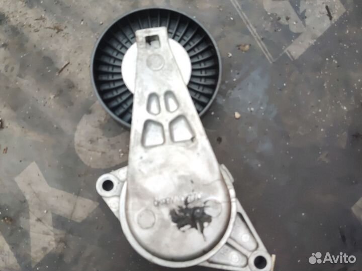 Натяжной ролик грм киа карнивал