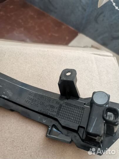 Повторитель поворота в зеркало Nissan Note E12 лев