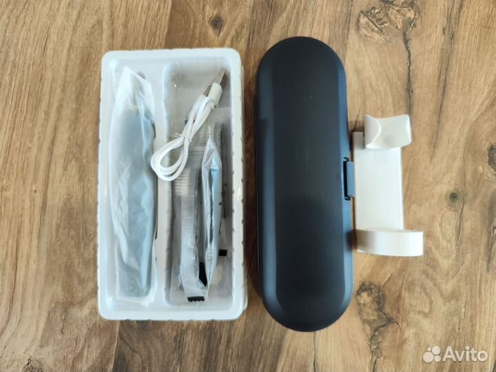 Электрическая зубная щётка