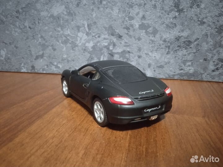 Машинка Porsche Cayman S 1:34
