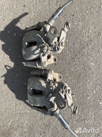 Суппорт тормозной задний Skoda Superb 2