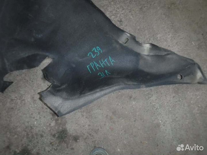 Обшивка багажника задняя левая Лада Гранта 11186
