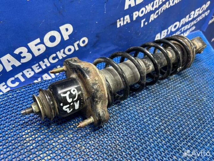 Задняя стойка амортизатора Mitsubishi Lancer 9