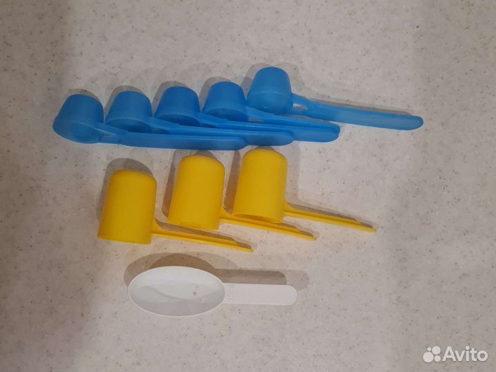 Новая пластиковая ложка мерная