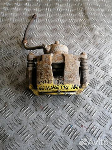 Суппорт тормозной передний правый Chevrolet