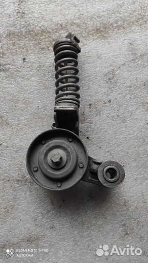 Натяжной ролик приводного ремня Opel Corsa D