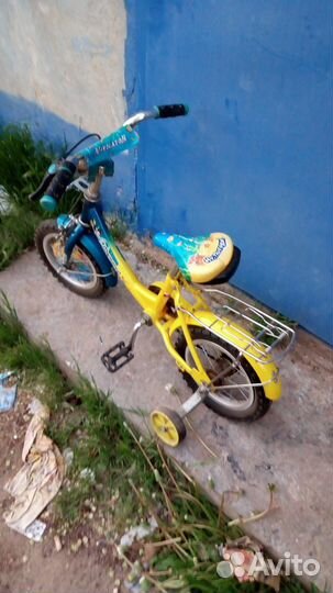 Детский четырёх колёсный велосипед