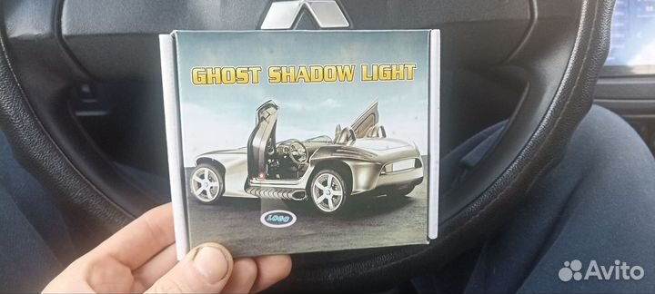 Проекция в двери Mitsubishi