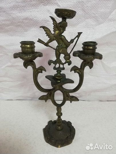 Старинный бронзовый подсвечник с Амуром