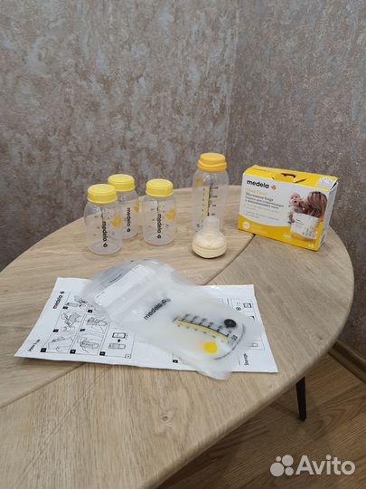 Смартсоска Medela Calma, бутылочки для кормления