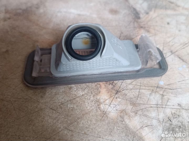 Фонарь подсветки номера L kia Rio 3