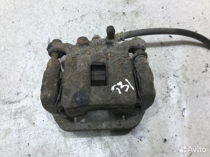 44001JG00A Суппорт задний R Nissan X-Trail T31