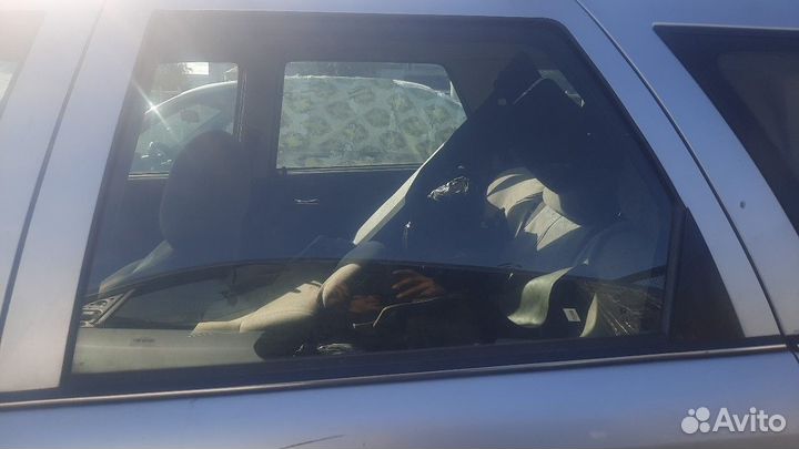 Стекло двери задней левой Opel Vectra