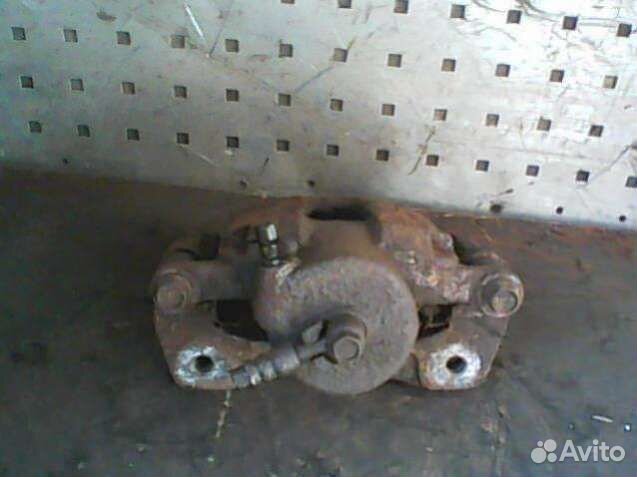 Суппорт тормозной передний левый Daewoo Nubira - J150/J190 рестайлинг (1999-2004)