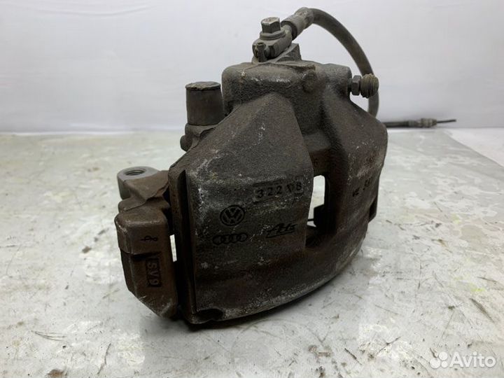 Суппорт передний левый Volkswagen Passat Cc 2.0