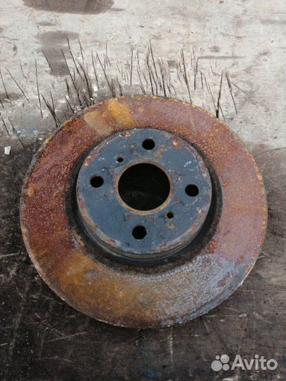 Тормозной диск передний Toyota Ractis SCP100 2SZ