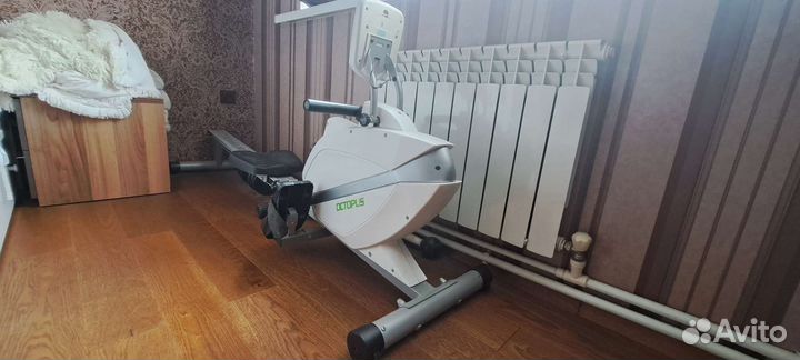 Гребной тренажер