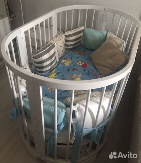 Детская кроватка с поперечным маятником