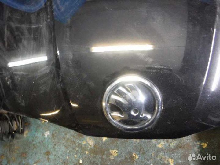 Капот Skoda Rapid