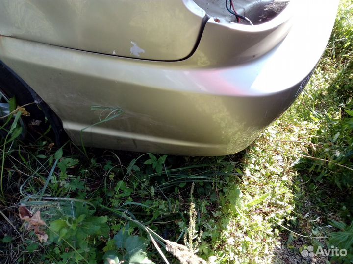 Бампер задний Kia Spectra