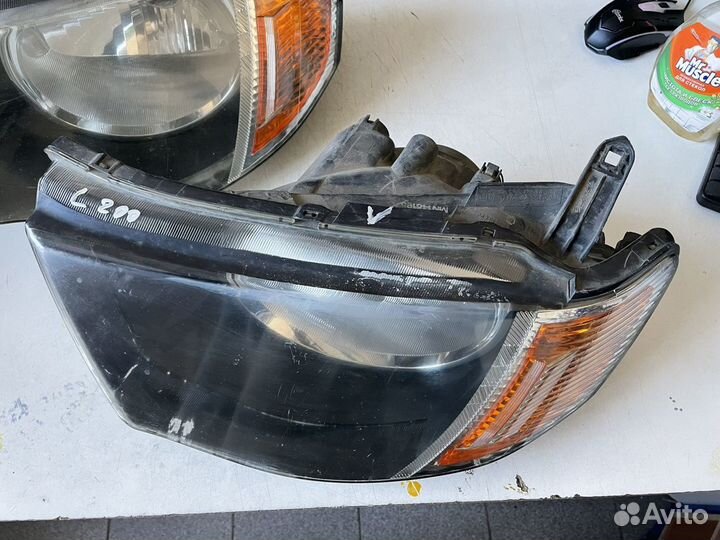 Фара левая Mitsubishi L200 2006-2016