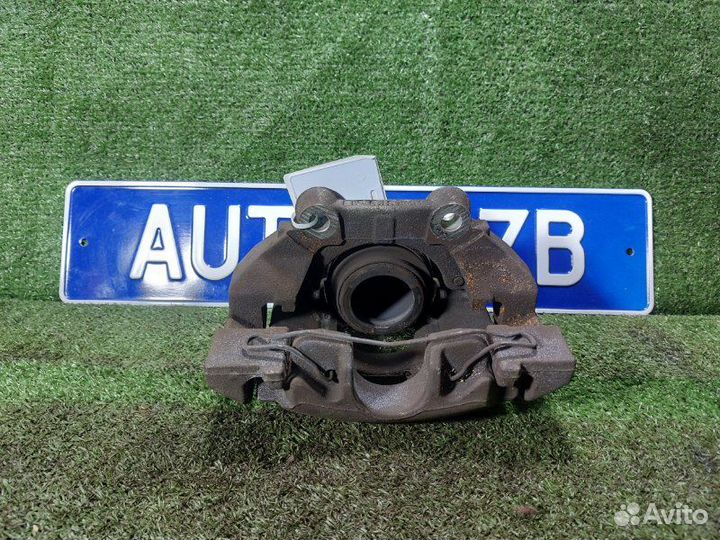 Суппорт тормозной передний левый Peugeot 308 Sw