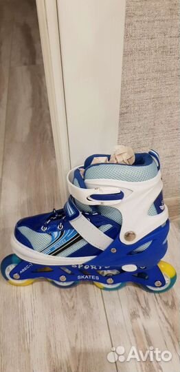 Роликовые коньки