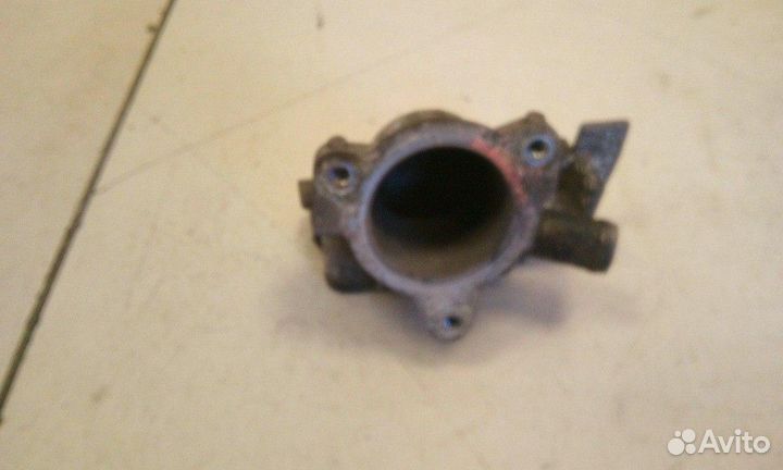 Корпус термостата Renault Logan