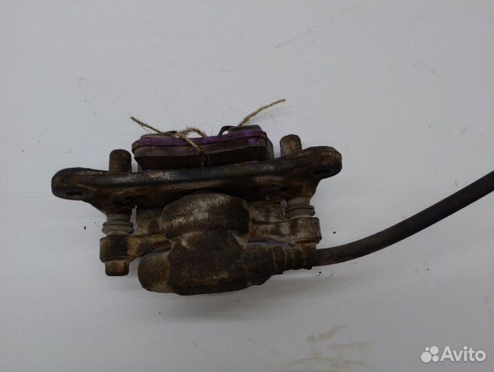 Суппорт тормозной задний правый Mitsubishi Grandis