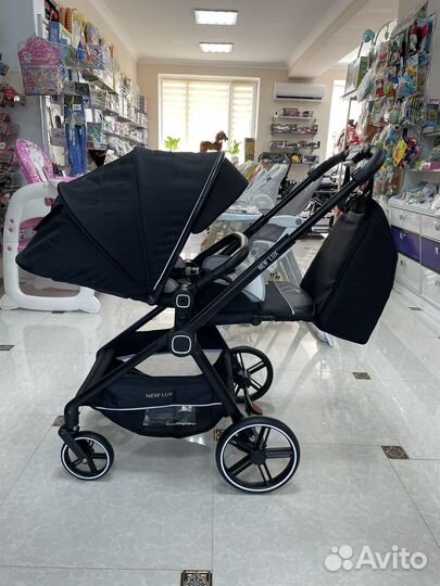 Коляска New Lux с реверсивным блоком