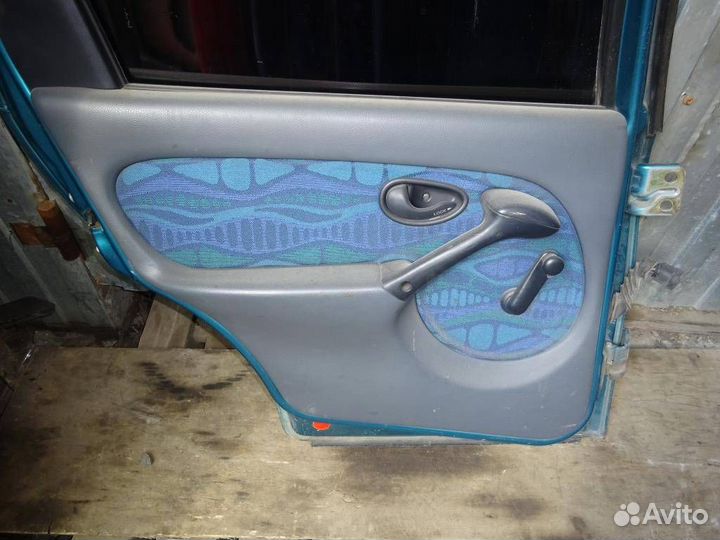 Обшивка двери задней левой Fiat Palio 1996-2002