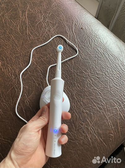 Электронная зубная щетка