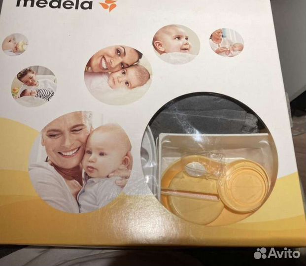 Молокоотсос medela электрический