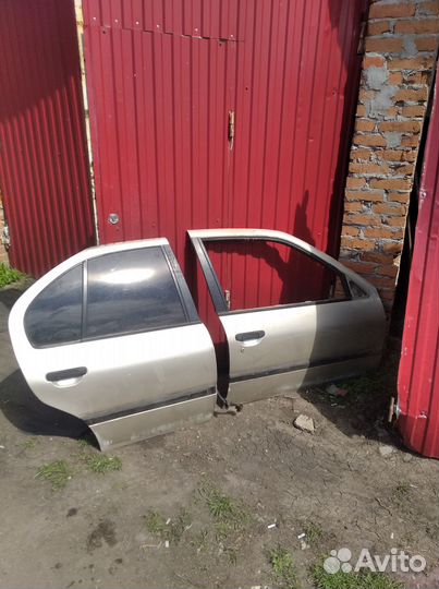 Правые двери Nissan primera P11